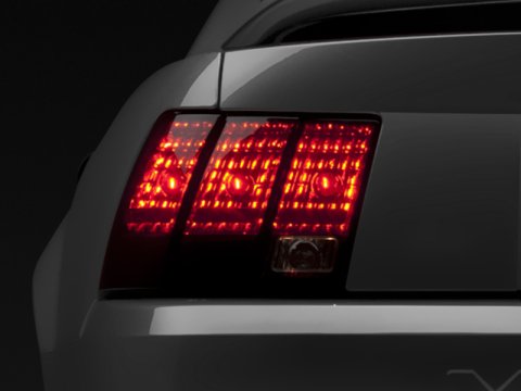 Raxiom 99-04 Ford Mustang Excluding 99-01 Cobra Tail Lights- Black Housing (Smoked Lens)