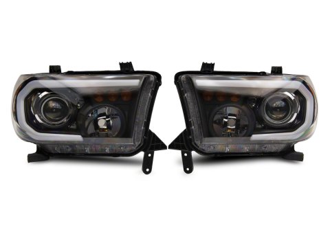 Raxiom 07-13 Toyota Tundra Axial Projector Headlights w/ SEQL LED Bar- Black Housing (Clear Lens)