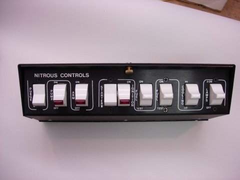 Switch Panel - Pro Stock Nitrous Control System - Overhead Mount - 11.375 x 2.625 x 3.5 in - 2 Momentary Rocker / 4 Rockers / 3 3-Way Position Rockers - Fused - Black - Each
