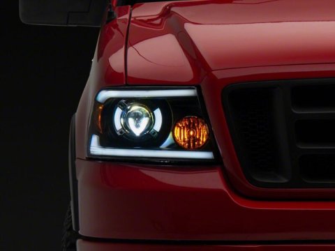 Raxiom 04-08 Ford F-150 Axial Series LED Proj Headlights/Seq LED Bar- Black- Clear Lens