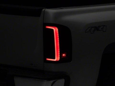 Raxiom 07-13 Chevrolet Silverado 1500 G2 LED Tail Lights- Black Housing- Smoked Lens