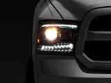 Raxiom 09-18 RAM 1500 LED Projector Headlights w/ Switchback Turn Signals- Blk Housing (Clear Lens) thumbnail 1