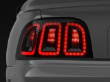 Raxiom 96-98 Ford Mustang Icon LED Tail Lights- Black Housing (Smoked Lens) thumbnail 1