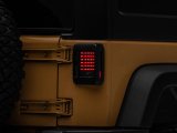 Raxiom 07-18 Jeep Wrangler JK LED Tail Lights- Black Housing (Smoked Lens) thumbnail 1