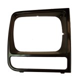 Omix RH Black Headlight Bezel 97-01 Jeep Cherokee (XJ) thumbnail 1