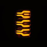 AlphaRex 19-21 Dodge Ram 1500 Luxx-Series LED Tail Lights Alpha-Black w/Activ Light/Seq Signal thumbnail 4