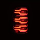 AlphaRex 19-21 Dodge Ram 1500 Luxx-Series LED Tail Lights Alpha-Black w/Activ Light/Seq Signal thumbnail 9