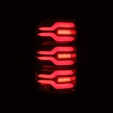 AlphaRex 19-21 Dodge Ram 1500 Luxx-Series LED Tail Lights Black/Red w/Activ Light/Seq Signal thumbnail 5