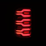 AlphaRex 19-21 Dodge Ram 1500 Luxx-Series LED Tail Lights Black/Red w/Activ Light/Seq Signal thumbnail 6