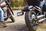 Kuryakyn License Plate Frames 3142 NOVA SIDE MT LP FRAME BLK thumbnail 1