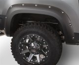 Bushwacker Pocket-Style Fender Flares for 2019-2026 SIERRA 1500, 2022 1500 LIMITED - 40102-02 Flares, Pocket Style, Rear, Black, Dura-Flex Thermoplastic, GMC, Pair thumbnail 1